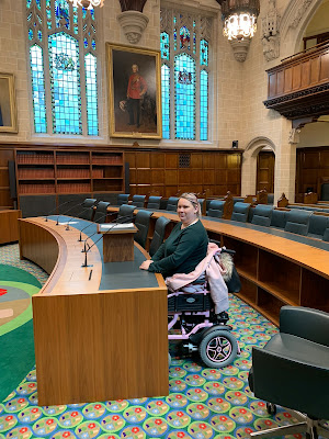 Supreme Court, Court Room One, Myself in Ppowerchair behind Barrister desk.