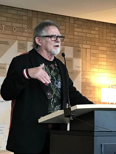 Moda Fabrics owner Mark Dunn speaking at the opening of his quilt exhibit "The Mark Dunn Collection" at the International Quilt Museum attended by Thistle Thicket Studio. www.thistlethicketstudio.com