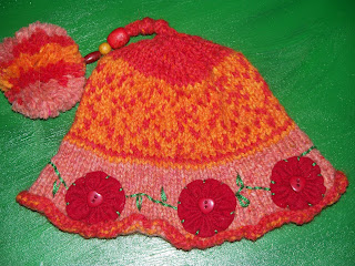 http://www.ravelry.com/projects/needleknack/maureen-odoogans-heartfelt-hat