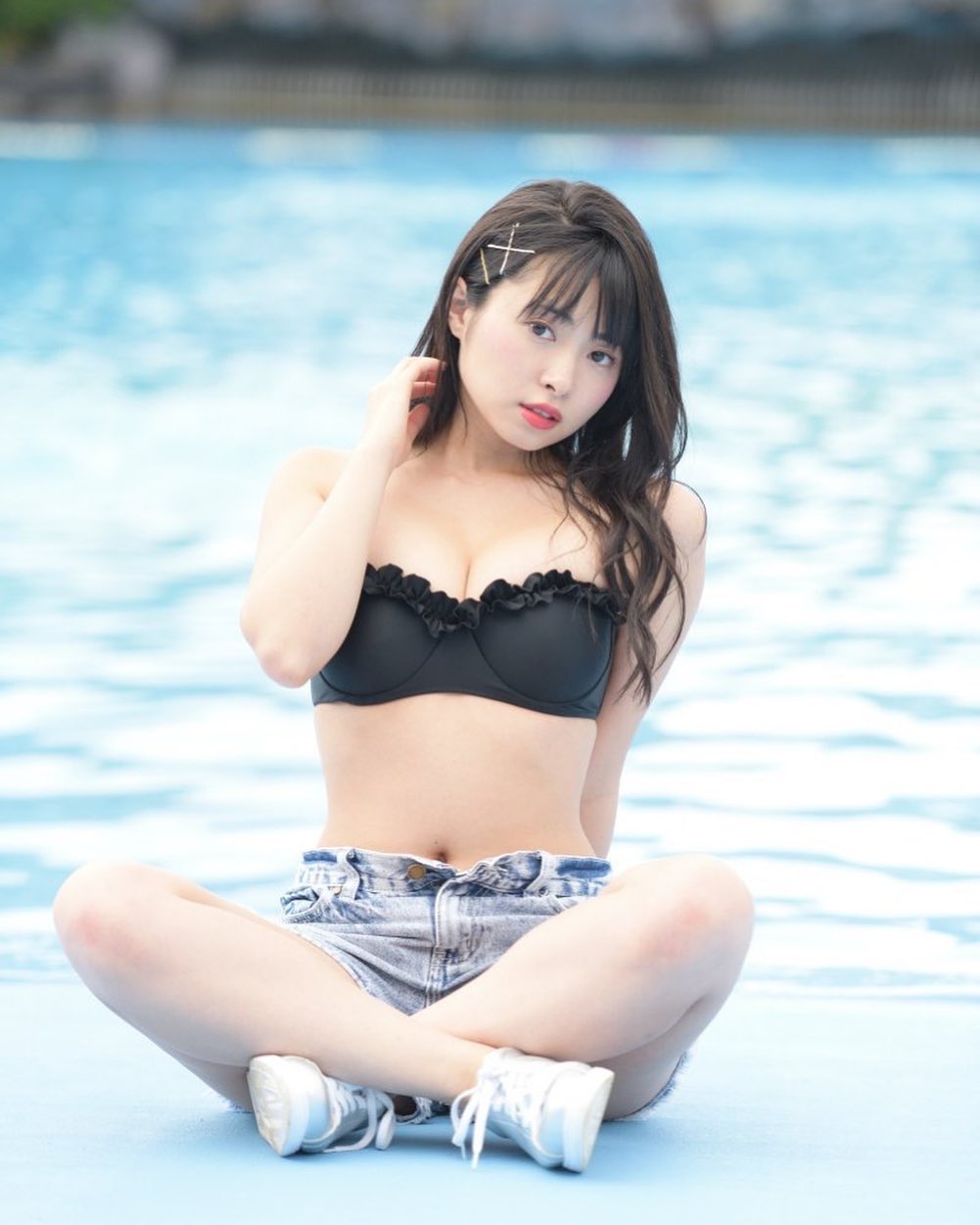 Nozomi Sato sexy Japanese gravure idol in cute black bikini top
