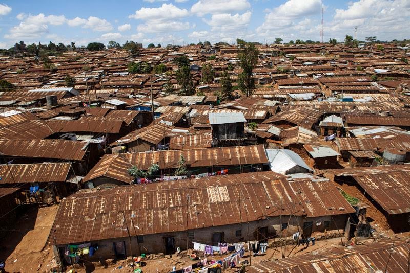 Kibera, The Nairobi neighborhood of Kibera, Africa's largest urban slum, in which around 1 million people live in close-packed tin shacks.
