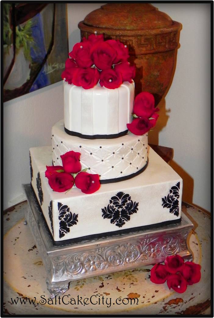 To keep to the black white and red theme we did an all white wedding cake 