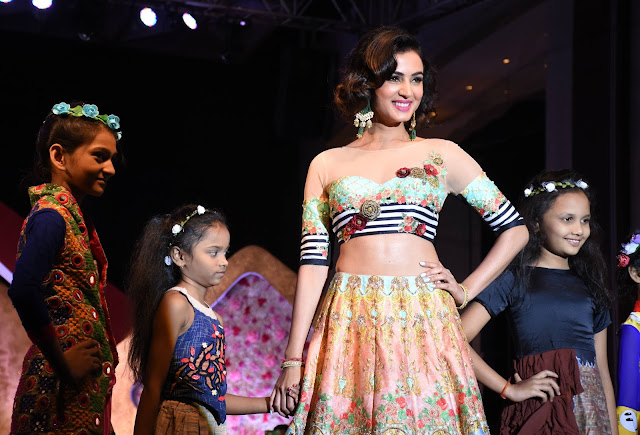 Actress Sonal Chauhan walking the ramp wearing beautiful earrings by Narayan Jewellers at Smile Foundation's Ramp for champs