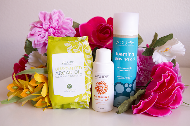 Photo of Acure cleansing towelettes, Acure dry shampoo, Acure shaving gel.