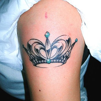 Crown tattoos go together perfectly with designs such as hearts,