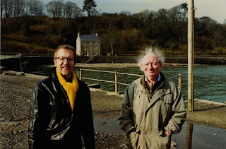 Image of Joe Vanek and Brian Friel, two caucasian men in the countryside next to the sea