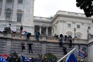 Thousands of Pres. Donald Trump's followers surrounded the building and burst in, the result, a remarkable scene of lawmakers fleeing and the police seemingly overwhelmed.