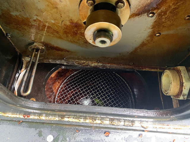 Wire mesh grill in place beneath where pelton runner normally is attached to the shaft.