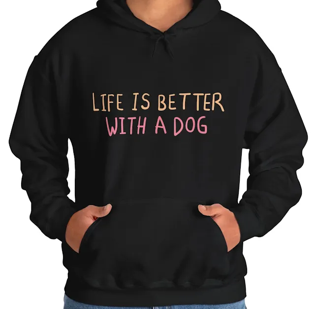 A Unisex Heavy Hoodie for Men and Women With Life is Better With a Dog Lettering Sticker.