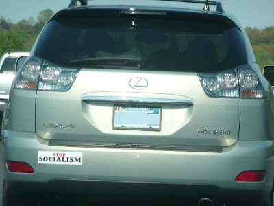 Lexus with stop socialism bumper sticker