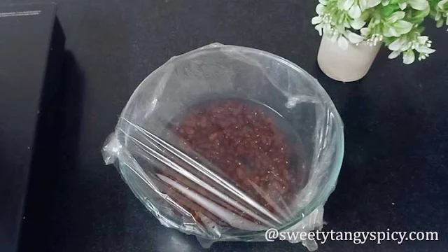 "The bowl of rajma covered with a lid or a clean cloth, left to soak overnight or for at least 8 hours. The beans will absorb water and expand, approximately doubling in size during this soaking process."