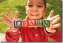 ist2_6456892-boy-holding-word-learn