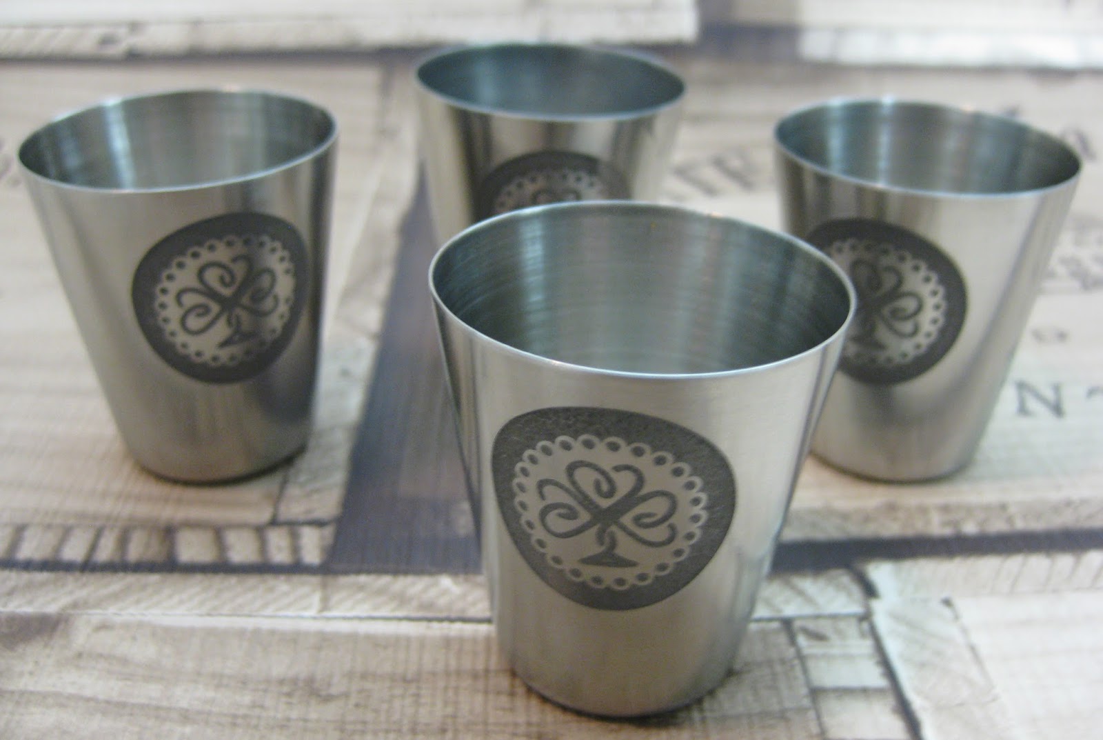 Stainless Steel Shot Glasses Etched with Edinburgh Etch Solution (Ferric Chloride) using Vinyl Resists Cut with Silhouette Cameo.  Tutorial by Nadine Muir for Silhouette UK Blog