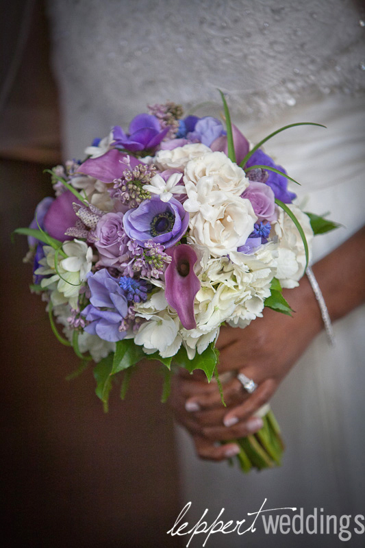 This bouquet is a light breeze of white lilac blue muscari gentle lavender 