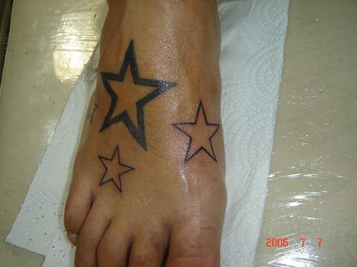 Three big stars foot tattoo picture.