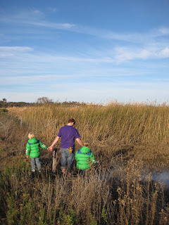 Kids fishing in the San Elijo Lagoon with their father.