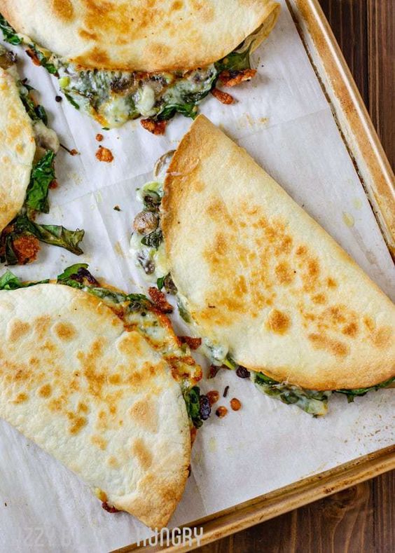 Baked Spinach Mushroom Quesadillas | DizzyBusyandHungry.com - My favorite quesadilla recipe! These are crispy, delicious, and chock full of nutrition. And baking these quesadillas allows you to make many at once, so you can feed your hungry family quickly and easily!