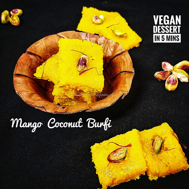 Traditional Coconut barfi in Mango flavor .  Quick fix vegan dessert under 5 mins, nariyal vadi, naralachi barfi , mango thengai barfi, how to make coconut barfi in microwave