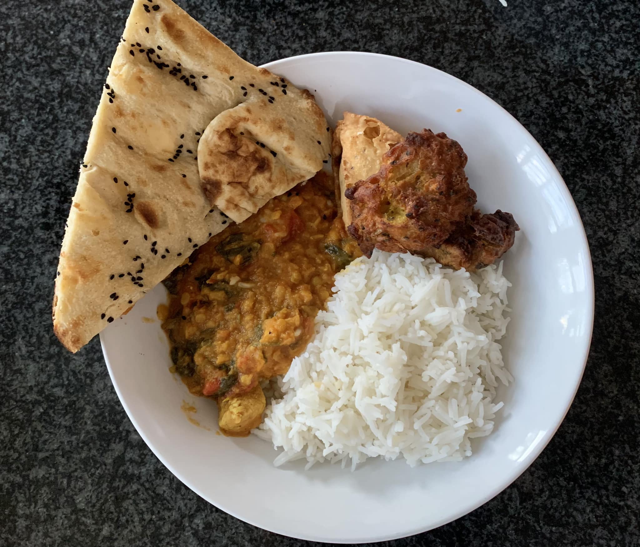 chicken saag curry with naan bread