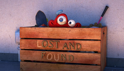 Lou, peaking out from his lost and found box