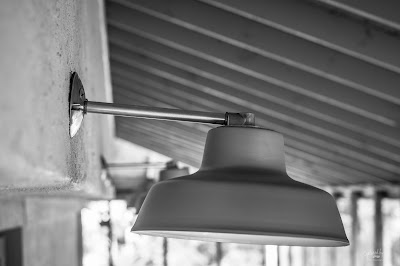 closeup of the outdoor light on a covered deck