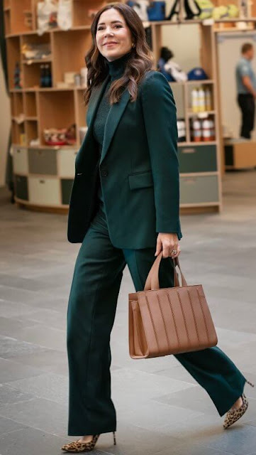 Crown Princess Mary wore a green wool flannel blazer by Massimo Dutti, and green trousers by Massimo Dutti. Rebekka Notkin