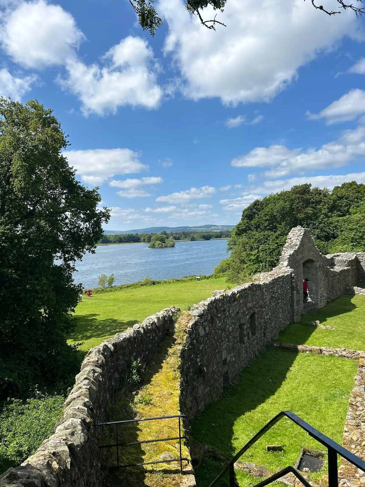 Distant view of Loch Leven Castle, emphasizing its isolation in the water.