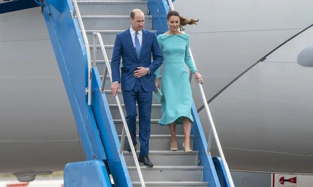 Kate Middleton wore a bespoke aquamarine fitted dress by Emilia Wickstead. Sezane Taylor earrings in turquoise