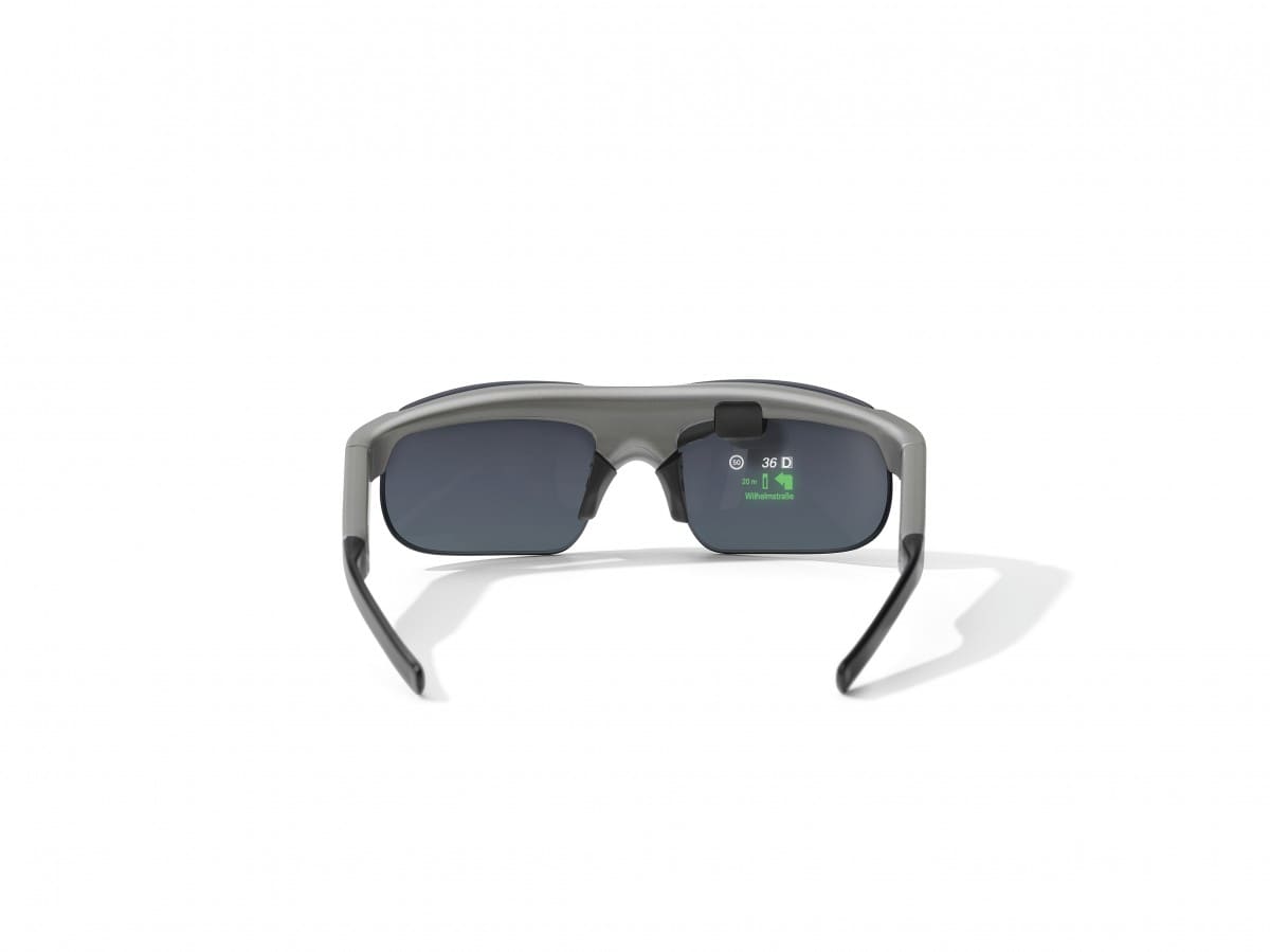 BMW ConnectedRide Smartglasses with head-up display technology showcasing real-time data projection