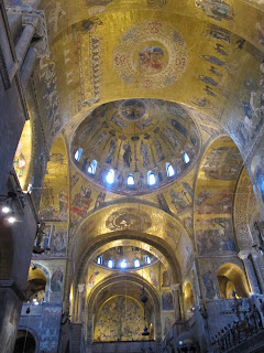 Illuminated interior of the Basilica San Marco, Venice, Italy.