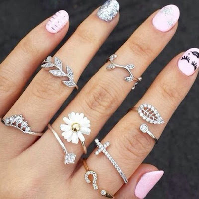 http://www.ladyqueen.com/3pcs-set-fashion-leaf-shaped-fully-jewelled-hollow-out-knuckle-ring-geometry-joint-finger-rings-sp0367.html