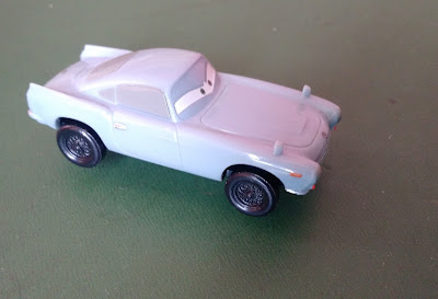Miniatura de plástico do carro Finn Mcmisile giro do desenho Carros 2 Disney  ,  6 cm R$ 8,00