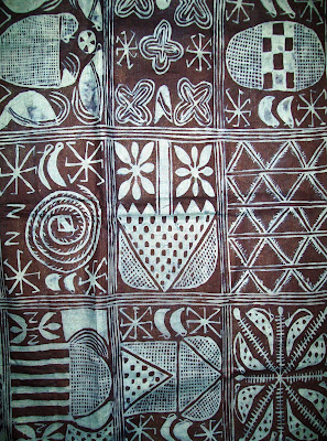 Yoruba Adire cloth with sun-wheel-like motif.