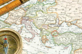 Map of Europe in 1914 with Gallipoli peninsula circled in red. A compass and ruler lie on top of the map