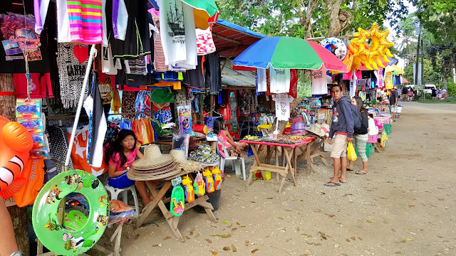 souvenir shops at the entrance of Matalom Port
