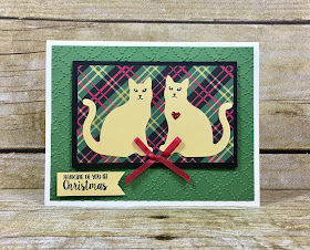 This Christmas card uses Stampin' Up!'s Cat Punch!  This punch is so versatile!  We also used the Spooky Cat and Season Like Christmas stamp set.  We also used the Christmas Around the World designer paper, Red Glimmer Paper, Cookie Cutter Builder Punch, and the Real Red 1/8" Solid Ribbon.  #stamptherapist #stampinup www.stamptherapist.com