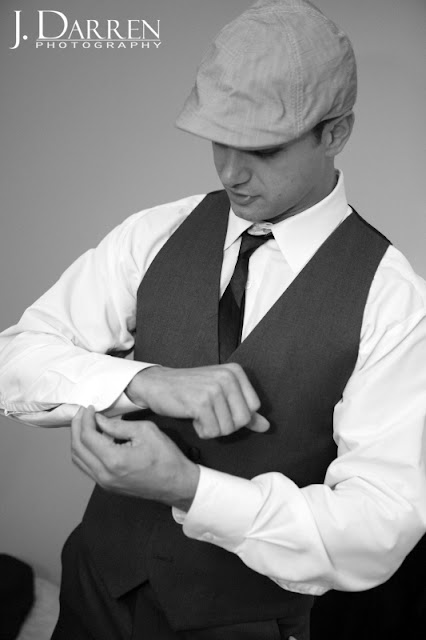 photo of the groom getting ready before his Wedding at Twelve West Main in Thomasville North Carolina