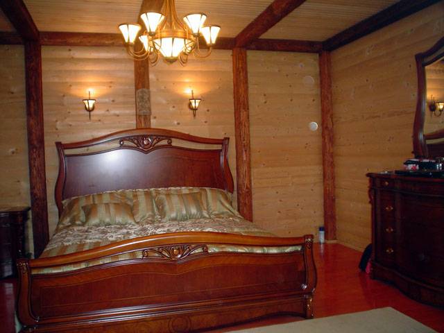 Bedroom in the wooden house