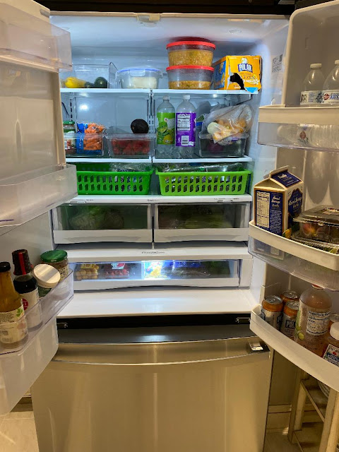 open stocked refrigerator
