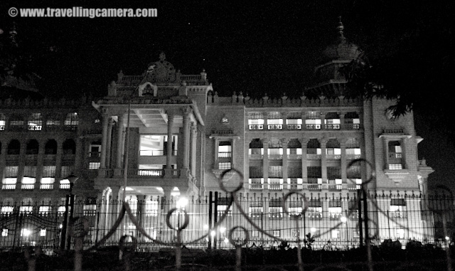 Night Photographs of Vidhan Saudha @ Banglore, Karnataka : Posted by VJ SHARMA on www.travellingcamera.com : Before going to Banglore I had heard a lot about Vidhan Saudha... Yes, you read it right : 'Saudha'... In North India Legistrative Assembly is called as Vidhan Sabha and this was the first change I noticed after reaching there...The Vidhana Soudha is located in Bangalore (Bengaluru) and its a seat of the state legislature of Karnataka. Vidhan Saudha has a very attractive building and the architecture has Indo Saracenic and Dravidian styles... Vidhan Saudha wa constructed in 1956 which I know from Wikipedia..Before going to Banglore I had heard a lot about Vidhan Saudha... Yes, you read it right : 'Saudha'... In North India Legistrative Assembly is called as Vidhan Sabha and this was the first change I noticed after reaching there...The Vidhana Soudha is located in Bangalore (Bengaluru) and its a seat of the state legislature of Karnataka. Vidhan Saudha has a very attractive building and the architecture has Indo Saracenic and Dravidian styles... Vidhan Saudha wa constructed in 1956 which I know from Wikipedia..I wanted to visit this place during day time but always plans changed and didn't get time to come here.. On the last day of my trip my friend brought me here at 1:00 am and I had no tripod... Some security people were also roaming around there and I didn't want to take any risk there.. So most of the shots were clicked within 5 minutes of duration by stopping our car in front of the building... But finally I got something and of-course, something is better than nothing :) shaky photograph of main entry of Vidhan Saudha in Banglore... A volvo bus which goes to airport was just crossing....While we were driving back for home, I saw another beautiful building and it was Banglore Post Office building... There is a red light near to this building and we were waiting for it to turn green...Black and White photographs hide all the noise due to high ISO :)