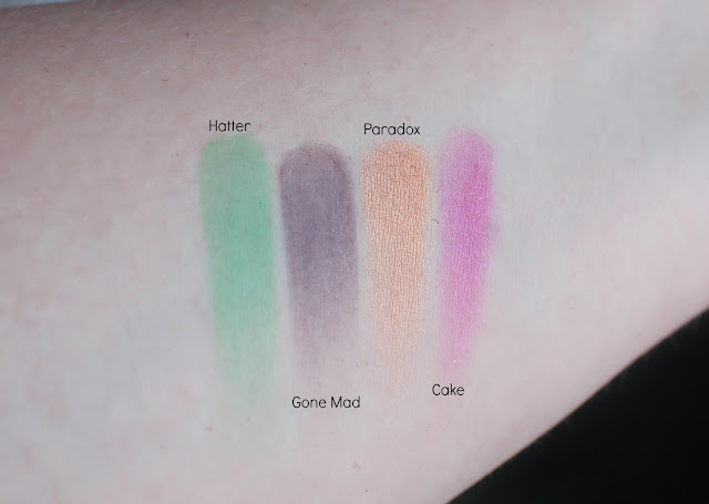 Photo of swatches of The Mad Hatter Shades from the Urban Decay Alice Through the Looking Glass Palette