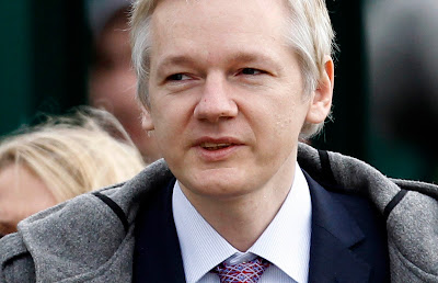 French president ‘stabbed me in back’ - Assange