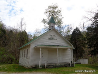 white church in Kentucky with pillars