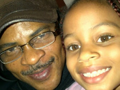 PICTURE OF FRED AMATA AND DAUGTHER