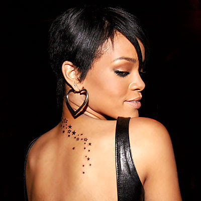 Celebrity Tattoos : Star Tattoos in Rihana's neck and Finger