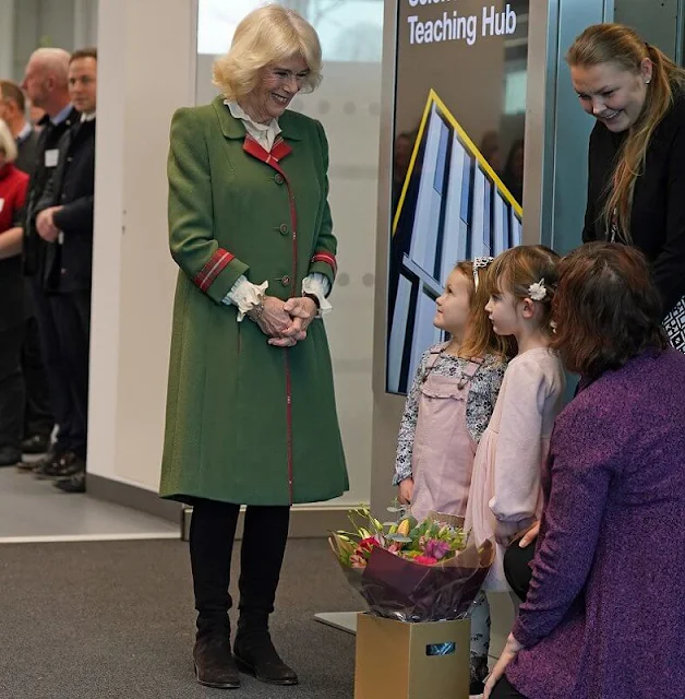 Camilla, Queen Consort wore a green wool coat and brown boots. Queen Camilla is the Chancellor of the University of Aberdeen