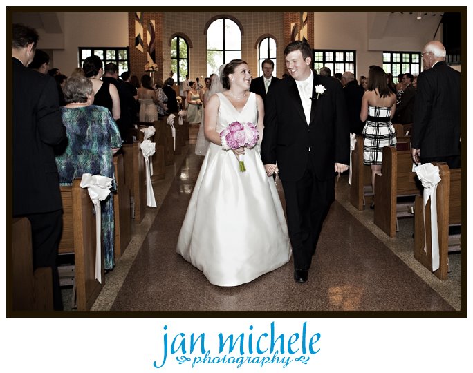 happy newlywed couple exiting church