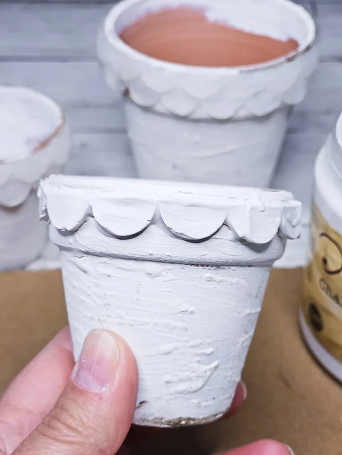textured and painted flower pot, hot glue scallop edge