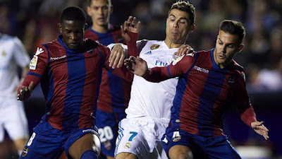 Levante Unión Deportiva draws Real Madrid at levante ud arena. Zinedine Zidane's Madrid went up from a Sergio 'Captain Fantastic' Ramos' header which was canceled out 31 minutes after by Ghanaian International Emmanuel Boateng ending 1-1 at half-time.  Isco came on for Gareth Bale to put Real Madrid in front again only for about 10 minutes before being canceled again by Levante's Giampaolo Pazzini.   Game ended 2-2 at full-time.  Yet another good game for Levante against Real Madrid - with both team drawing their two legs in the Spanish La Liga this season.   Another embarrassing outing for the Santiago Bernabéu outfits at levante ud arena. Madrid risk a trophy-less season and Zidane risks getting 'SACKED'!   Real Madrid seem like the team any team can beat or draw as they struggle to pick rhythm. The sting is just not there upfront with Cristiano Ronaldo, Karim Benzema and Gareth Bale all starting and getting substituted (Ronaldo and Bale). The defense is just 'bad'.   Real Madrid are currently fourth on the table with 39 points while Barcelona are top with 57 points!    DSCUS