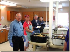 Carolyn helps in the kitchen